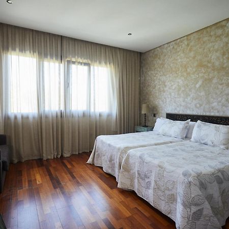 Hotel El Mirlo Blanco Канделеда Екстериор снимка