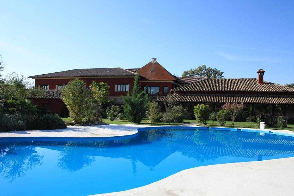 Hotel El Mirlo Blanco Канделеда Екстериор снимка