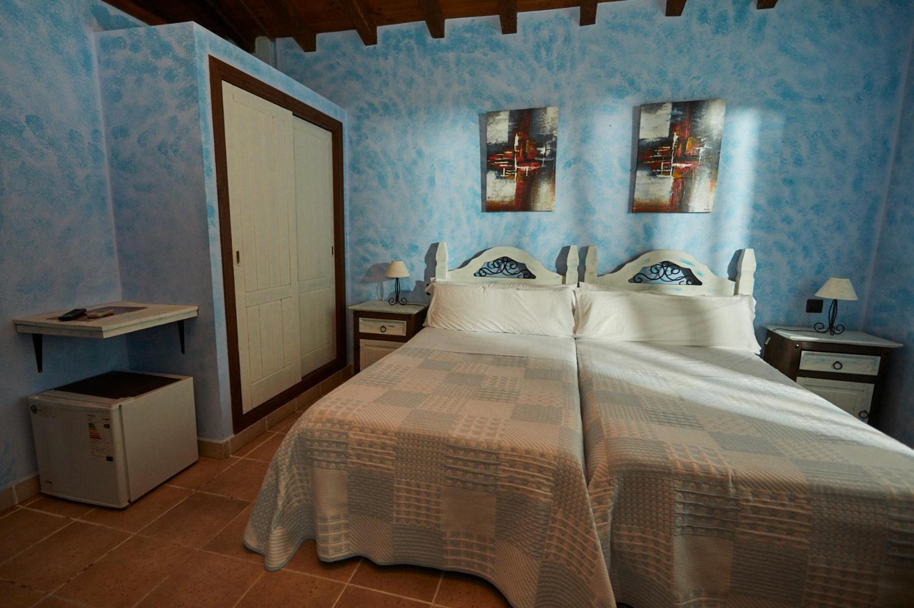 Hotel El Mirlo Blanco Канделеда Екстериор снимка